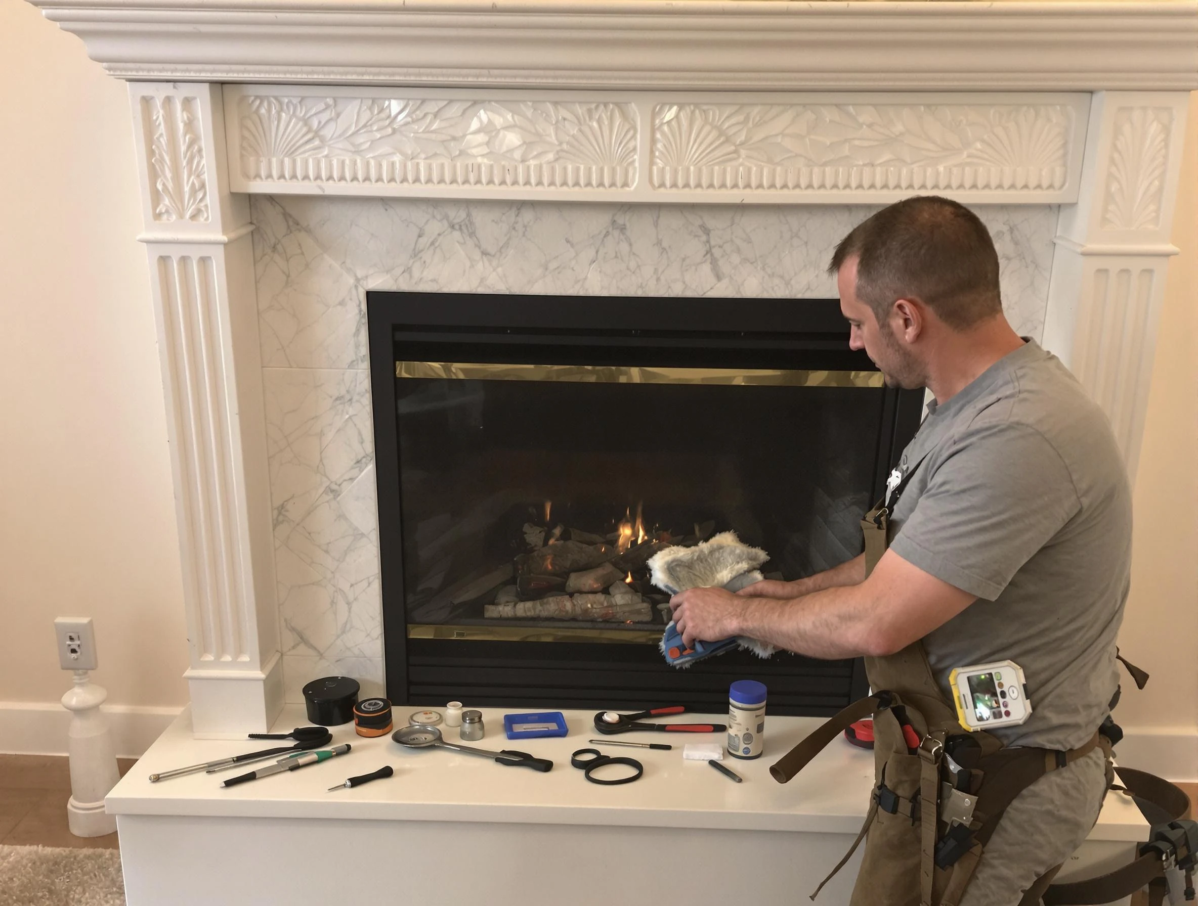 Hampton Chimney Sweep performing fireplace maintenance in Hampton, GA